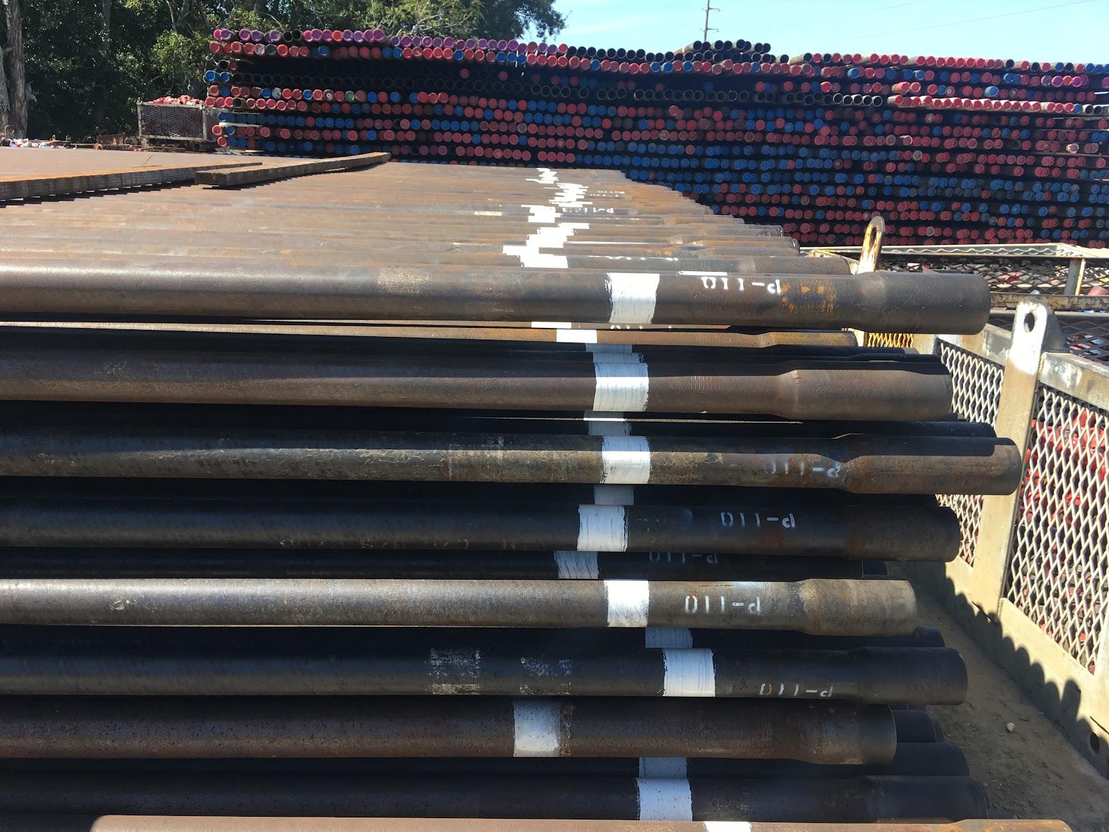 Racks of oilfield tubing in the Martin Pipe yard, Lafayette, Louisiana